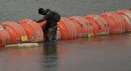 Federal judge orders Texas to remove barrier for migrants in Rio Grande