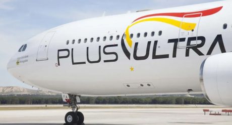 Mid-flight, a passenger tries to open the door, and a crew member breaks their leg while stopping them